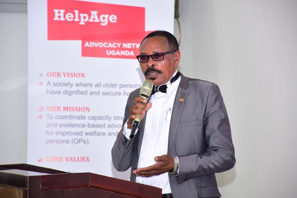  Figure 7: The Guest of Honor, Col Apuuli Brown, who represented the Minister of State for the Elderly, Mr Gidudu Mafabi, addressing the meeting