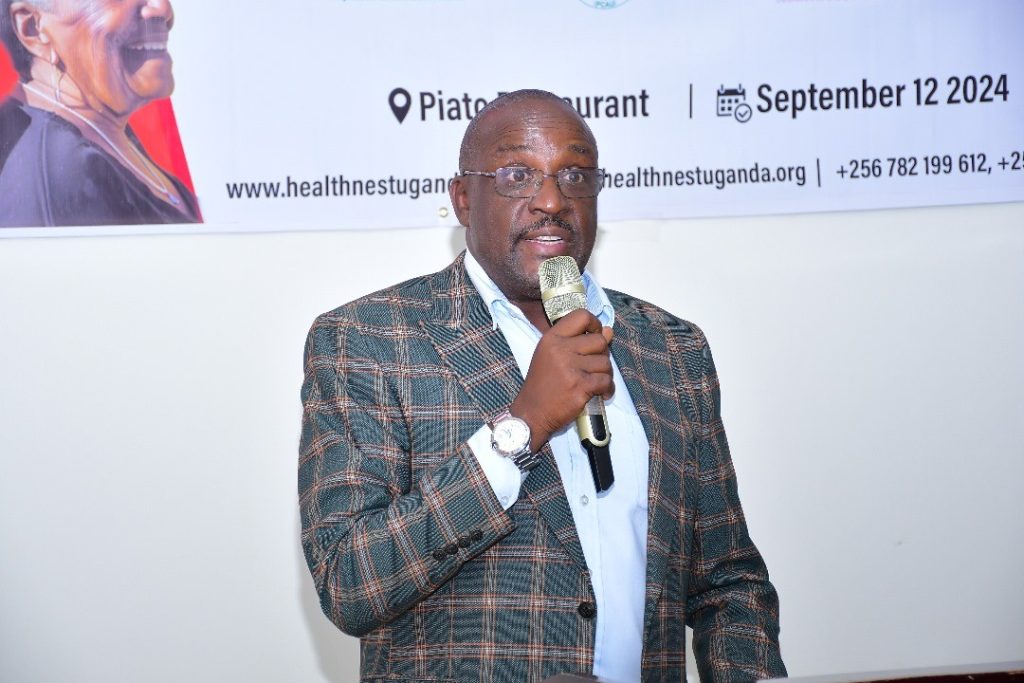 Figure 4: HANU Board Chairperson addressing participants on the significance of the Strategic Plan to Older Persons in Uganda