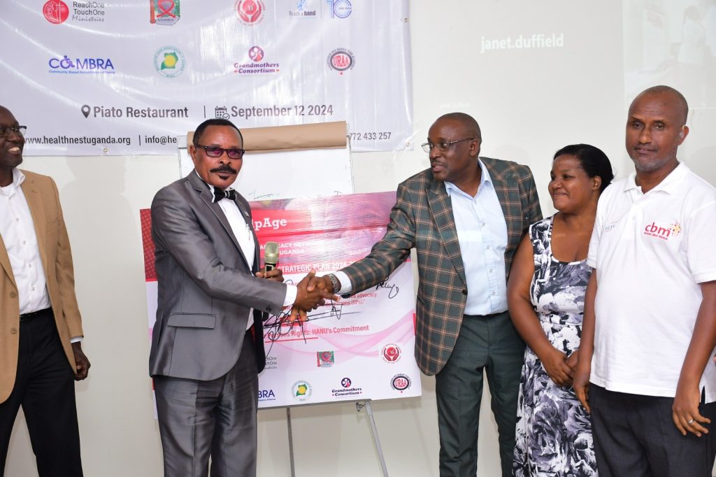 Figure 5: The HANU Chairperson Mr Arthur Namara and Col Apuuli Brown who represented the Minister of State for the Elderly Mr Gidudu Mafabi at the launch of the HANU Strategic Plan